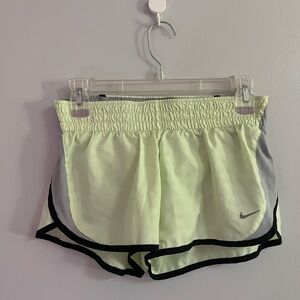 Nike Women's Pale Yellow Athletic Shorts
